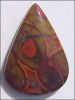 POPPY JASPER DESIGNER CABOCHON (U.S.A.) � 24.1 ct. Pear Shape